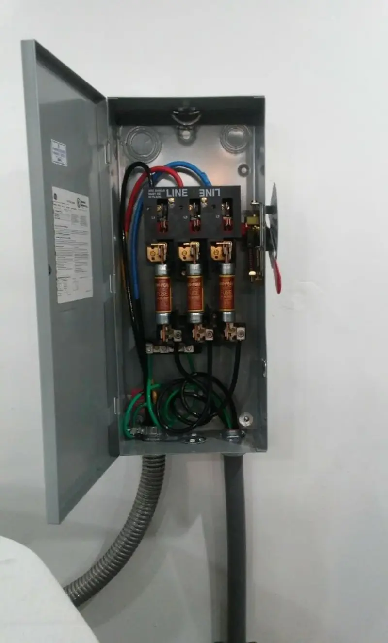 Three-phase disconnect switch installed for Smoke Detector Installation in Belding