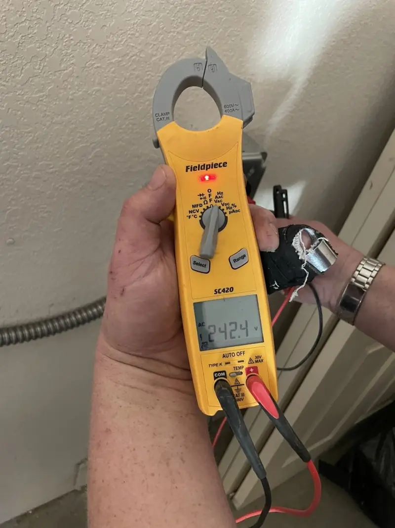 Voltage testing with clamp meter during Aluminum Wiring Replacement in Belding